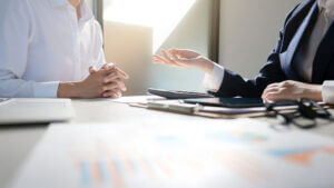 Business Colleagues Meeting About Invest Performance At A Modern